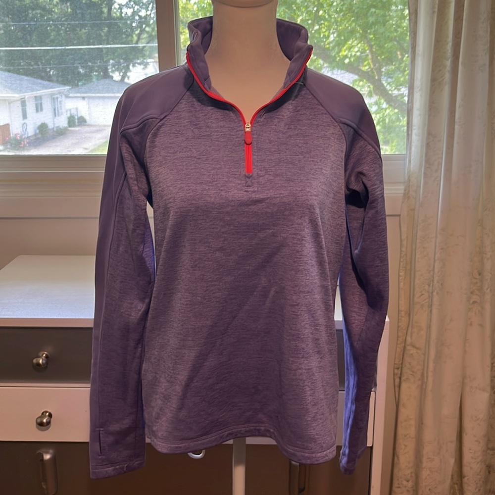 Nice Under Armour pull over. Lavender with neon pink. Size XL girls.